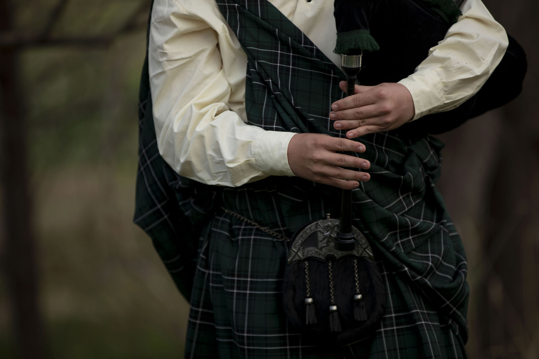 050820-news-bagpiper 10.jpg